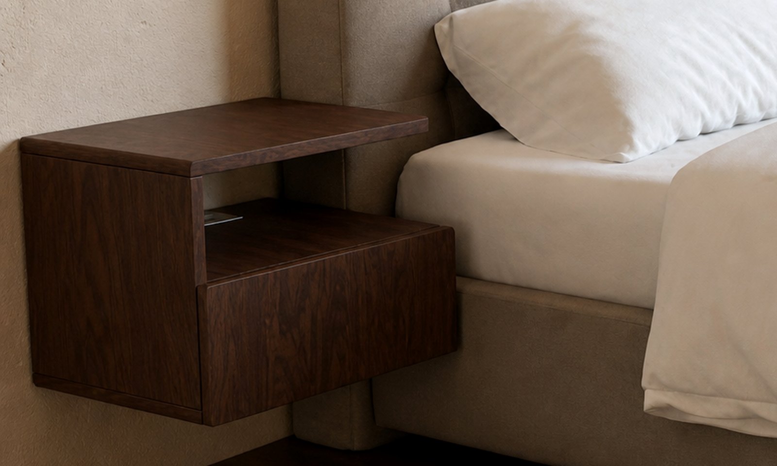 MOA MADE wall-mounted floating nightstand in walnut, mounted beside a bed